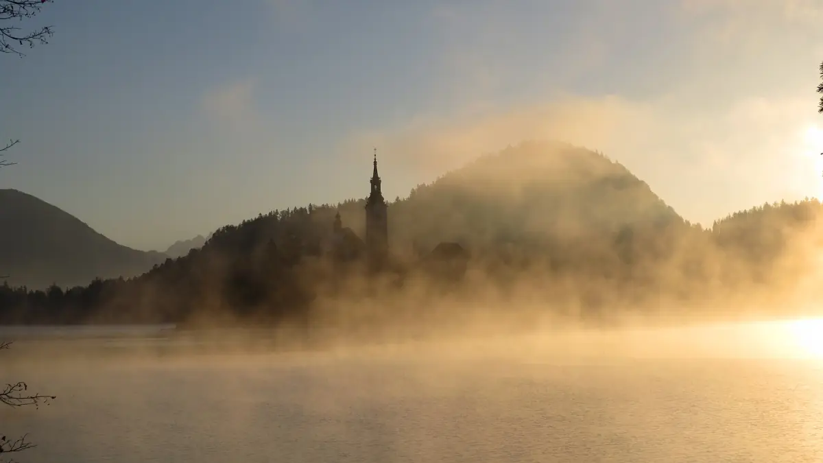 Mist over Lake Bled at sunrise