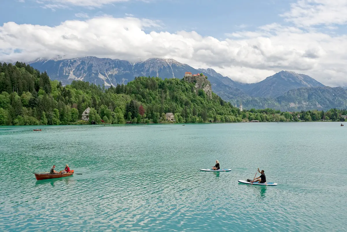 Rowing boats on Lake Bled below the castle